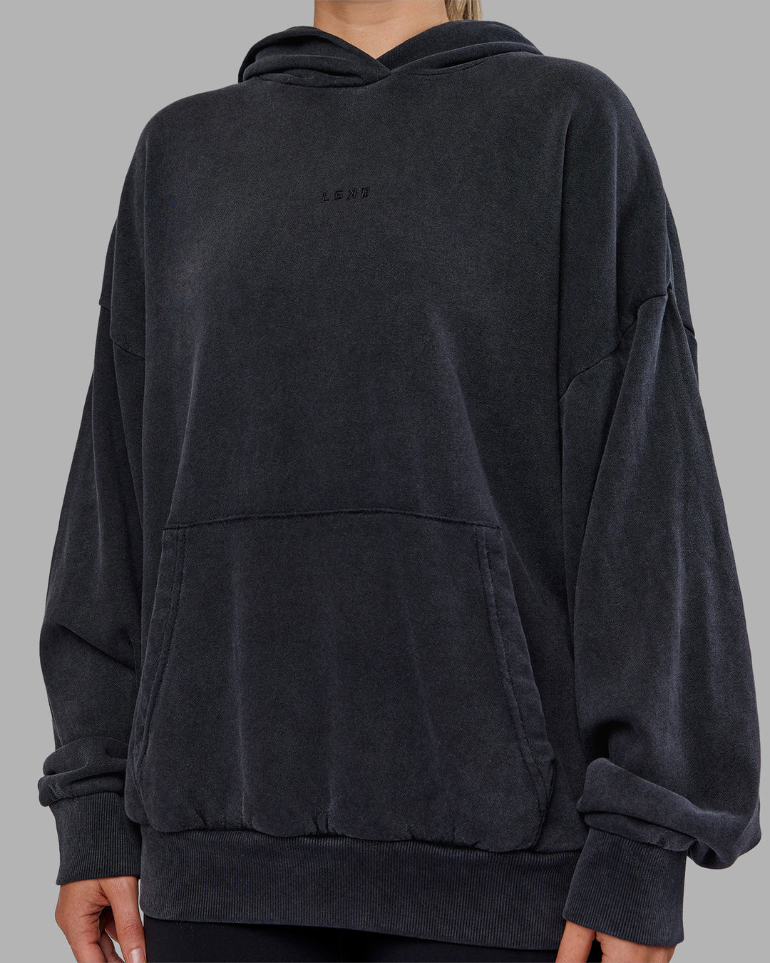 Woman wearing MVP Washed Terry Oversized Hoodie - Black Washed | Model:Neve | Size:XS
