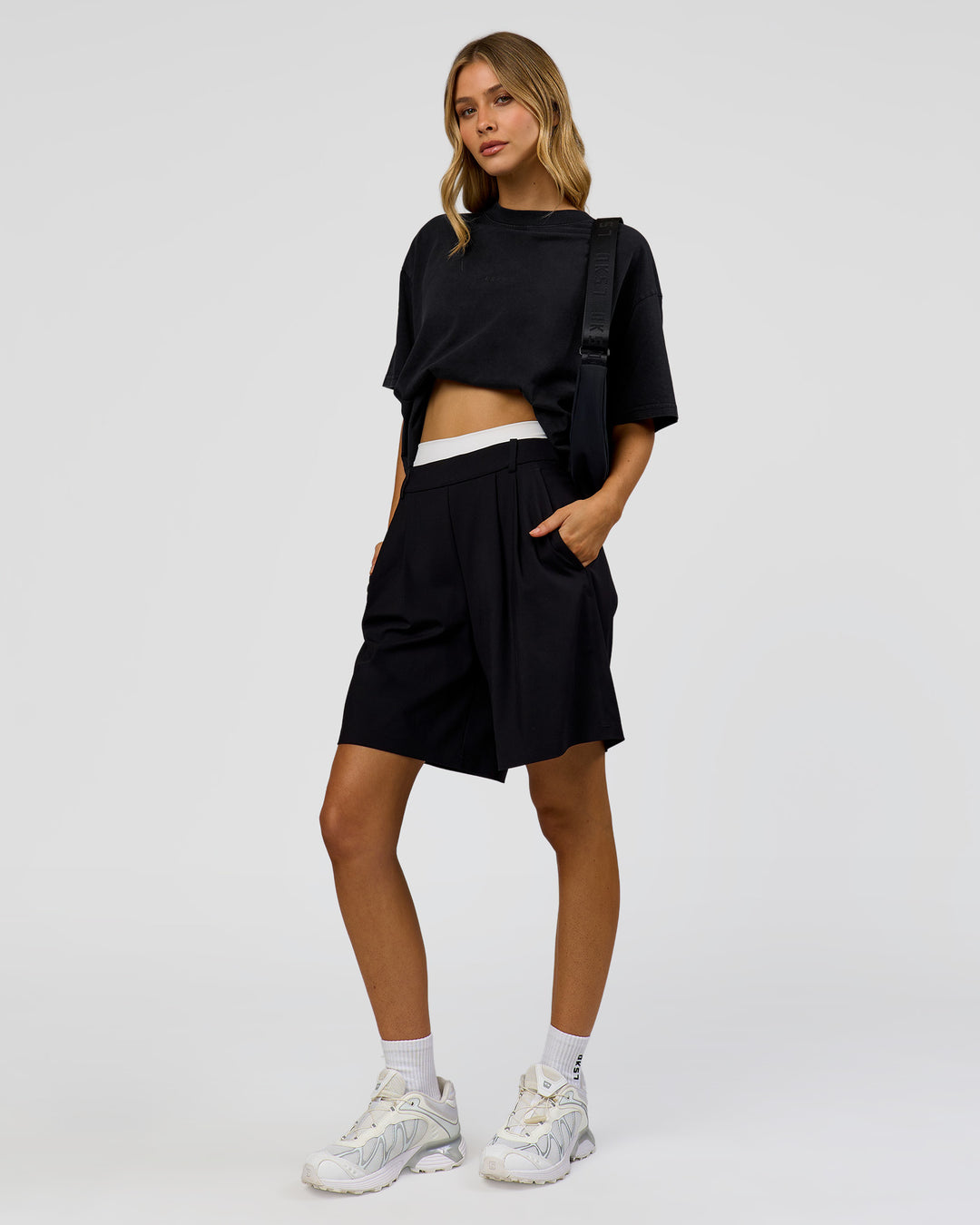 Woman wearing Memory in Motion Heavyweight Oversized Tee - Black Washed | Model:Leilani | Size:XS