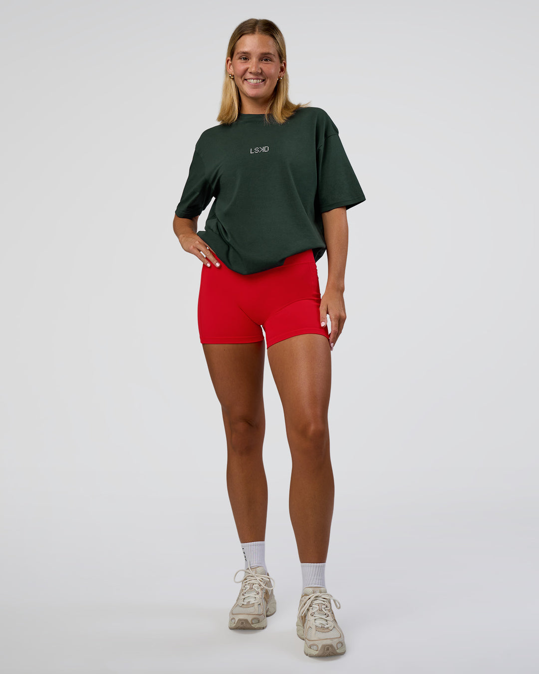 Woman wearing Merry Journey FLXCotton Oversized Tee - Vital Green-White | Model:Amity | Size:XS