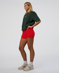 Woman wearing Merry Journey FLXCotton Oversized Tee - Vital Green-White | Model:Amity | Size:XS