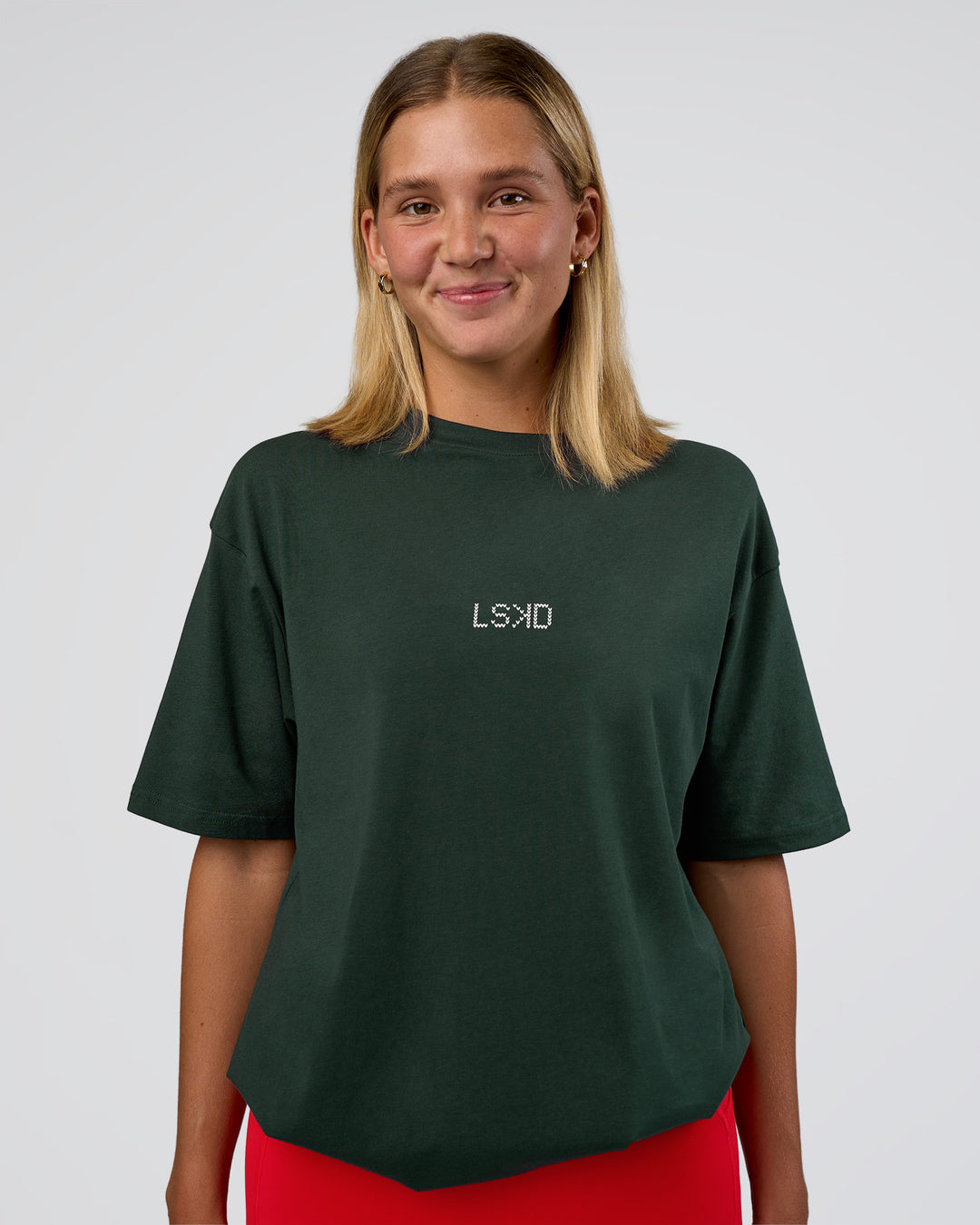 Woman wearing Merry Journey FLXCotton Oversized Tee - Vital Green-White | Model:Amity | Size:XS