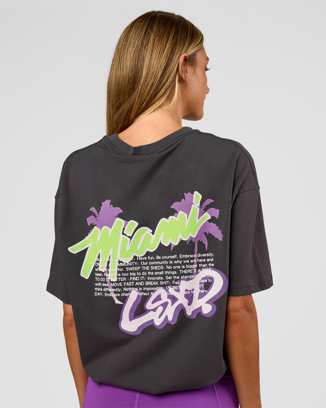 Woman wearing Miami Snatch FLXCotton Oversized Tee - Dark Storm-Marshmallow | Model:Georgia | Size:XS