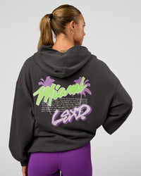 Woman wearing Miami Vibe Oversized Hoodie - Dark Storm-Marshmallow | Model:Maja | Size:XS
