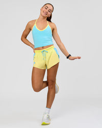 Woman wearing Milla Shelf Bra Tank - Baltic Sea-Lemon | Model:Grace | Size:XS
