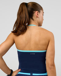 Woman wearing Milla Shelf Bra Tank - Future Navy-Baltic Sea | Model:Grace | Size:XS
