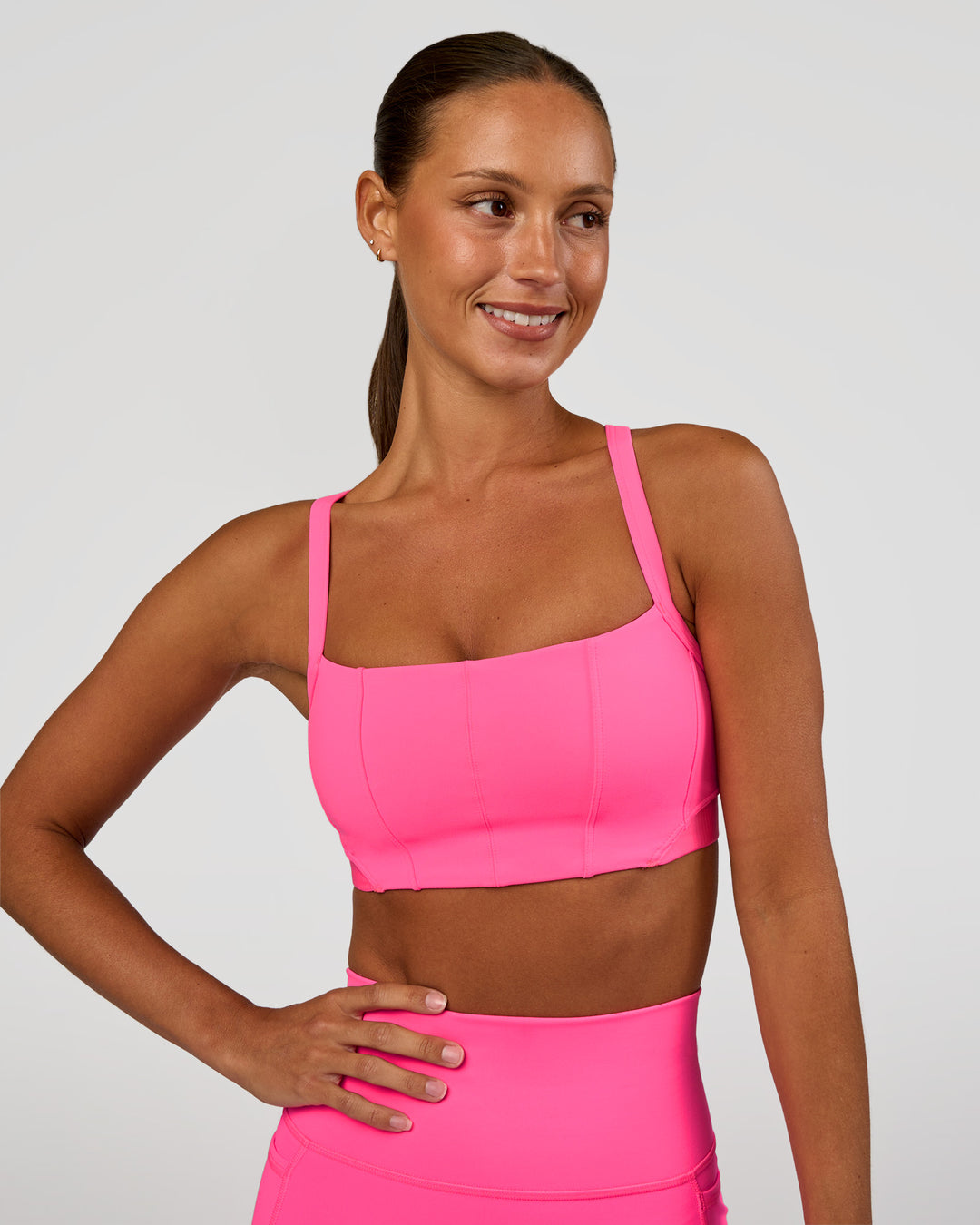 Woman wearing Momentum Corset Sports Bra - Sugar Plum | Model:Brylee | Size:XS