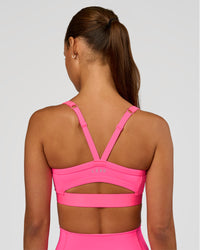 Woman wearing Momentum Corset Sports Bra - Sugar Plum | Model:Brylee | Size:XS