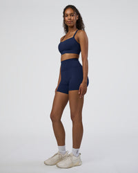 Woman wearing Momentum Sports Bra D/DD/E - Future Navy | Model:Jordan | Size:XS