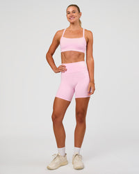 Woman wearing Momentum Sports Bra - Marshmallow | Model:Emelia | Size:XS