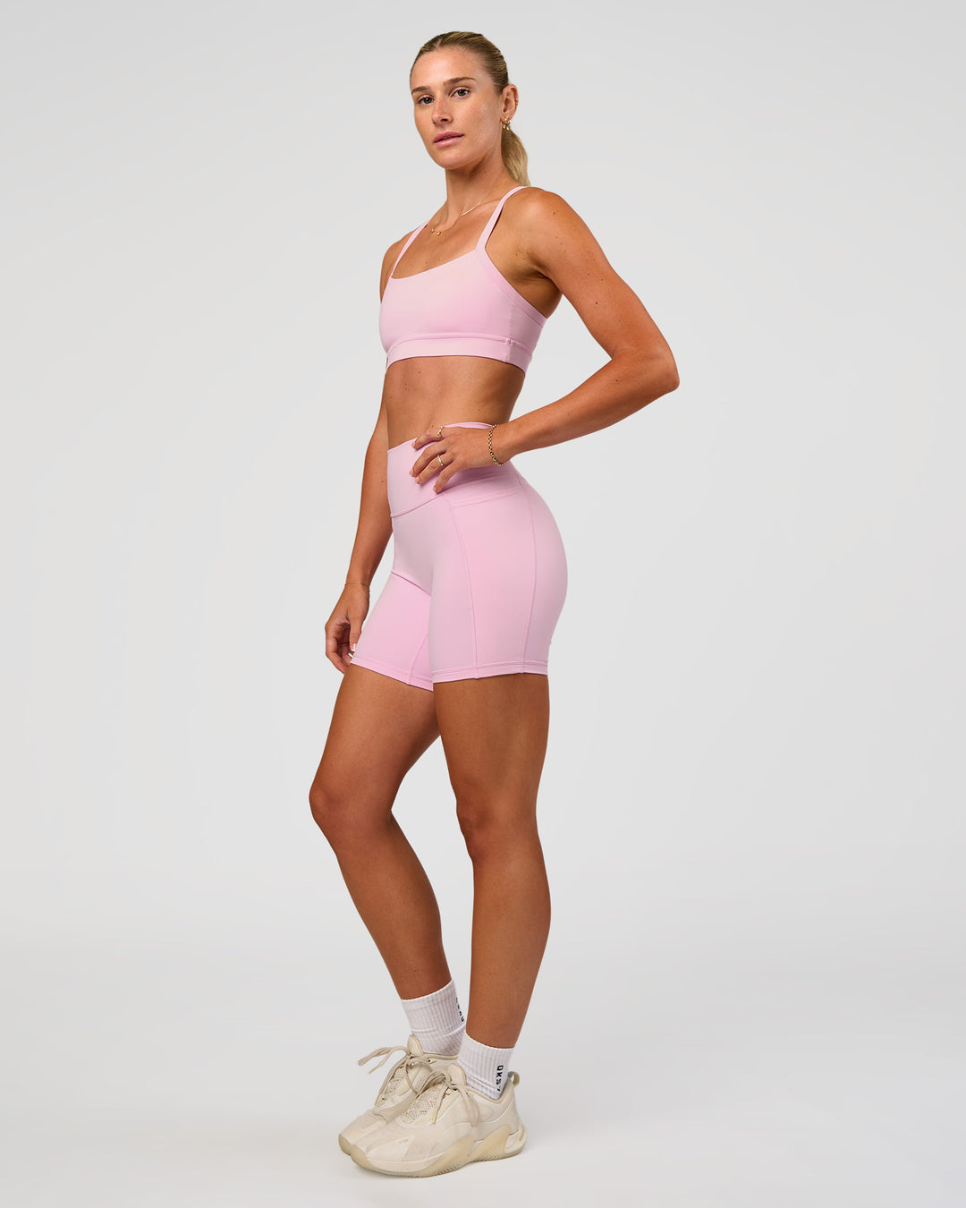 Woman wearing Momentum Sports Bra - Marshmallow | Model:Emelia | Size:XS