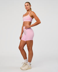 Woman wearing Momentum Sports Bra - Marshmallow | Model:Emelia | Size:XS