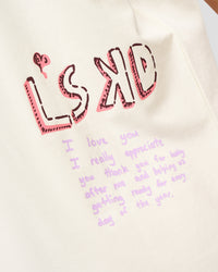 Woman wearing Mother's Day FLXCotton Oversize Tee - Off White | Model:Brylee | Size:XS