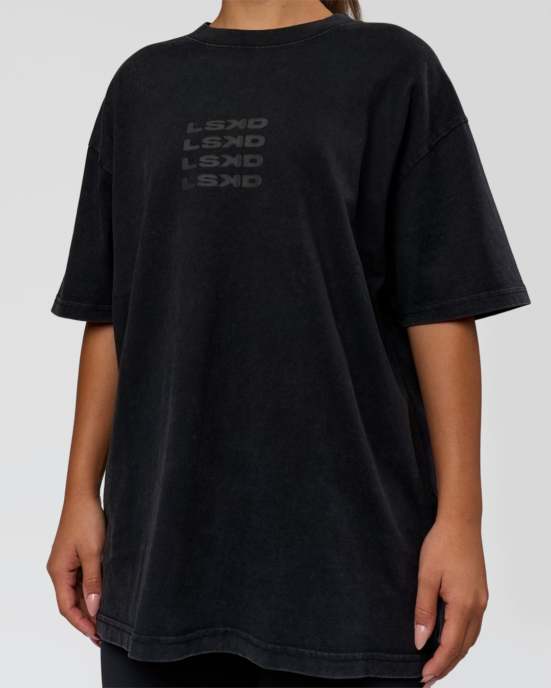 Woman wearing Move Fast Heavyweight Oversized Tee - Black Washed | Model:Sophia | Size:XS