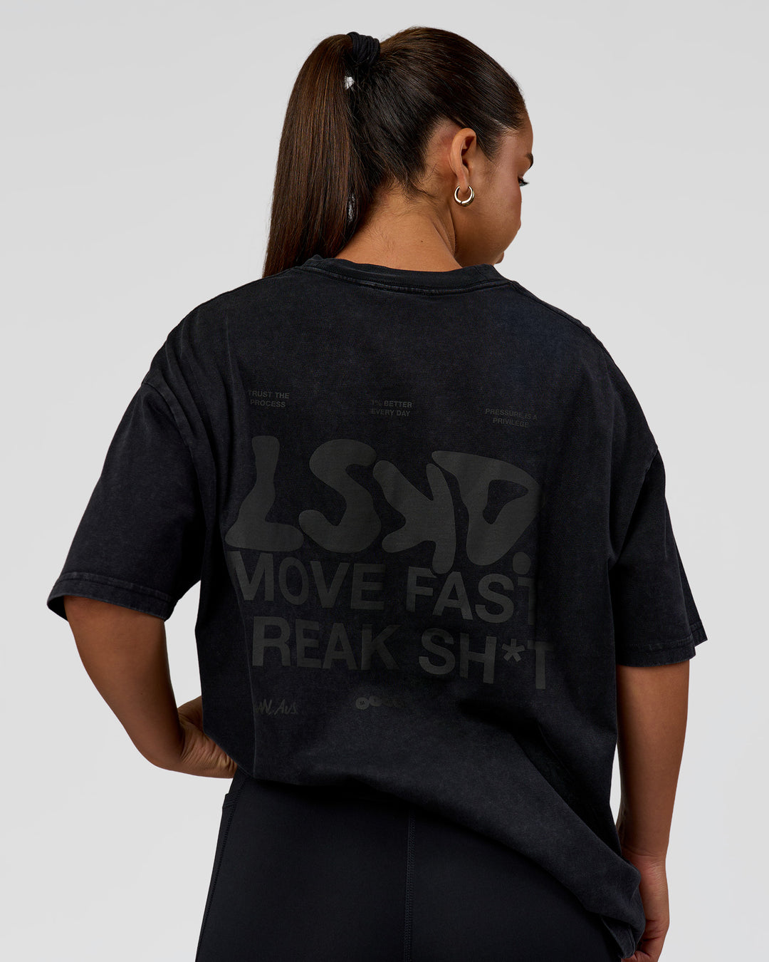 Woman wearing Move Fast Heavyweight Oversized Tee - Black Washed | Model:Sophia | Size:XS