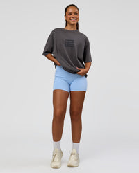 Woman wearing Move Fast Heavyweight Oversized Tee - Dark Storm Washed | Model:Sophia | Size:XS