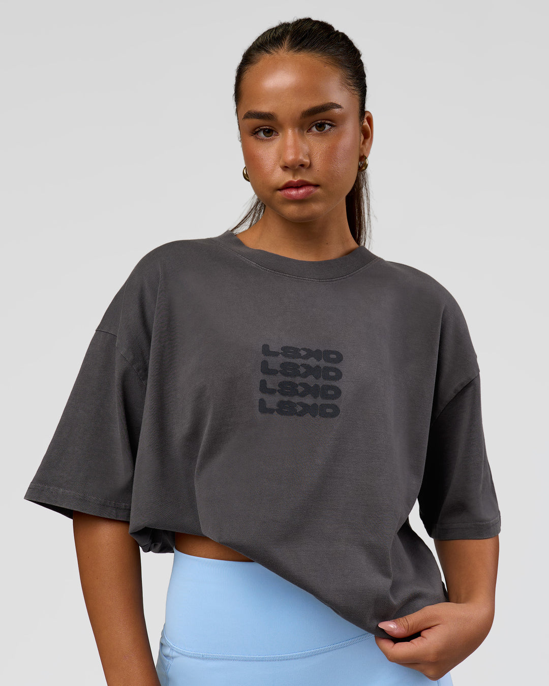 Woman wearing Move Fast Heavyweight Oversized Tee - Dark Storm Washed | Model:Sophia | Size:XS