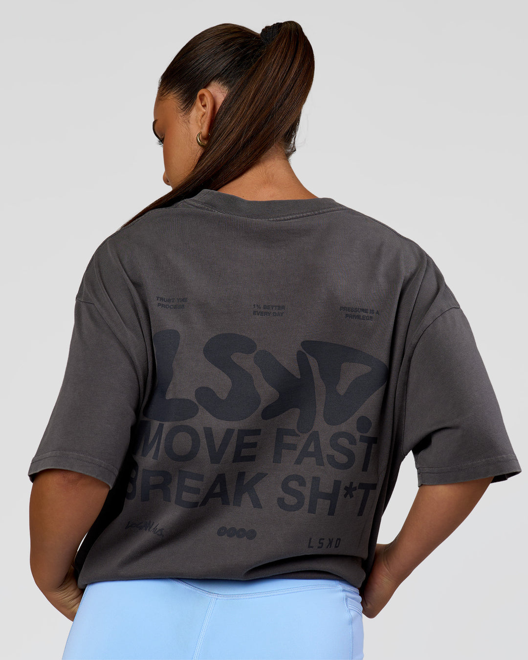 Woman wearing Move Fast Heavyweight Oversized Tee - Dark Storm Washed | Model:Sophia | Size:XS