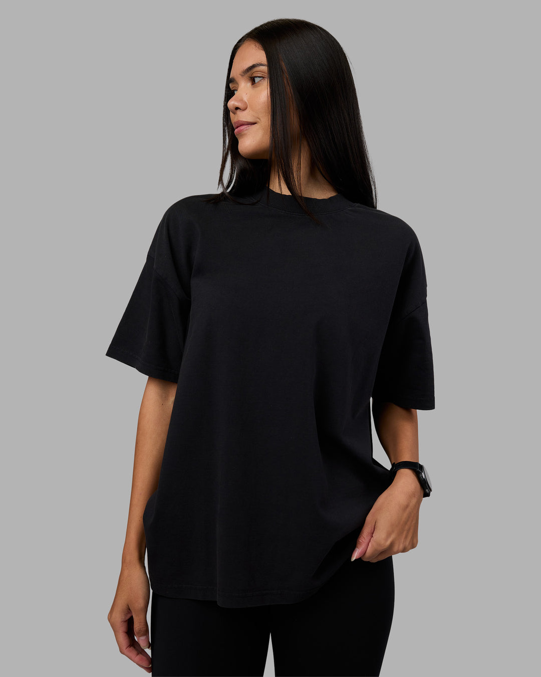 Woman wearing Move Fast Washed Heavyweight Tee Oversize - Black-Island Paradise | Model:Rhiley | Size:XS