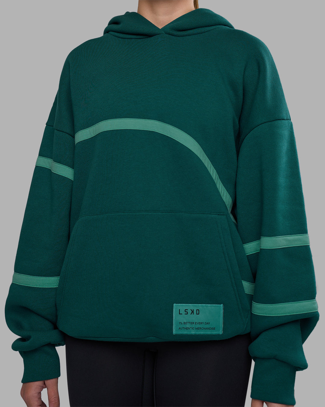 Woman wearing Movement Oversized Hoodie - Dark Moss-Agate Green | Model:Phoebe | Size:XS