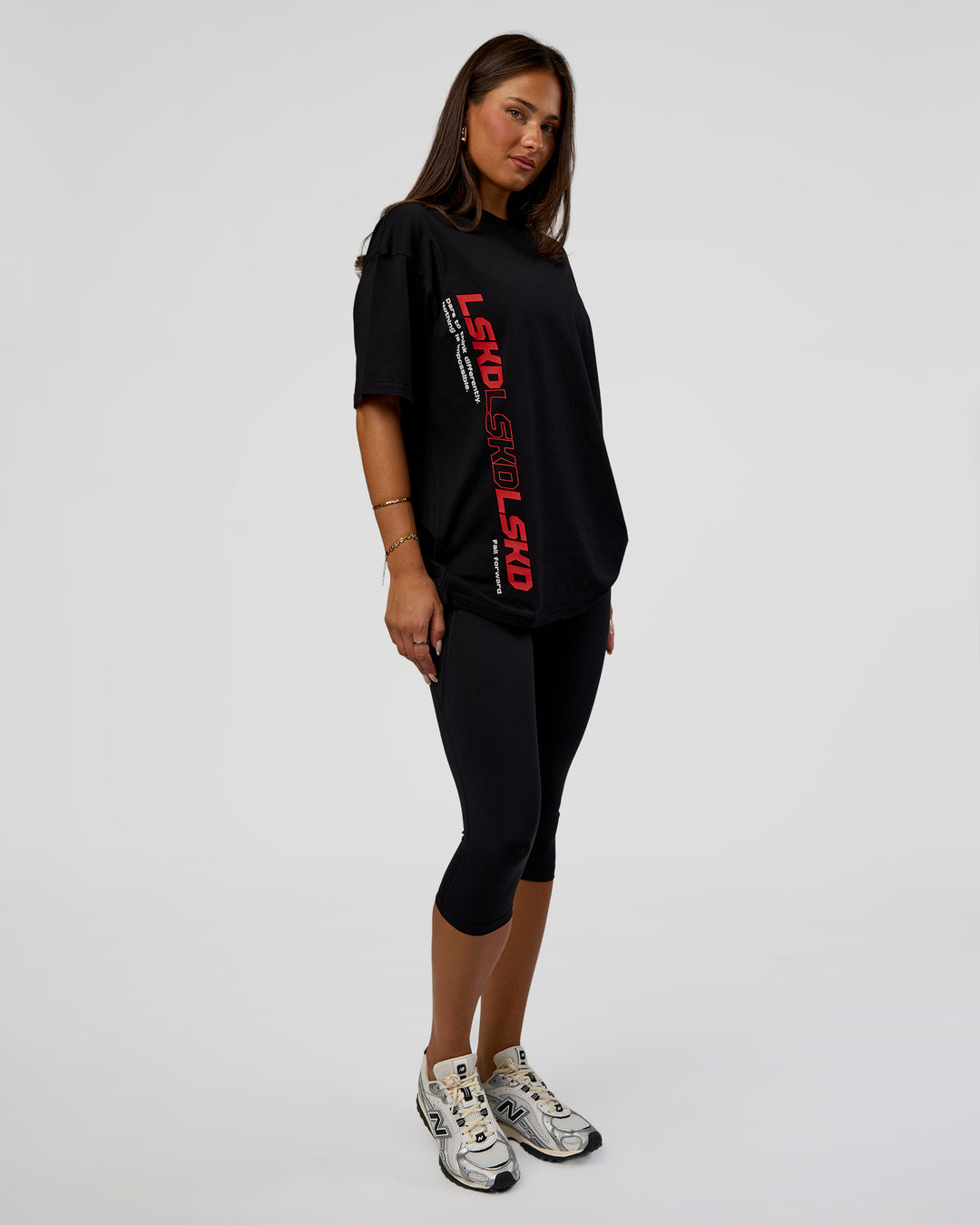 Woman wearing Nothing Is Impossible FLXCotton Oversized Tee - Black-Flame | Model:Bianca | Size:XS
