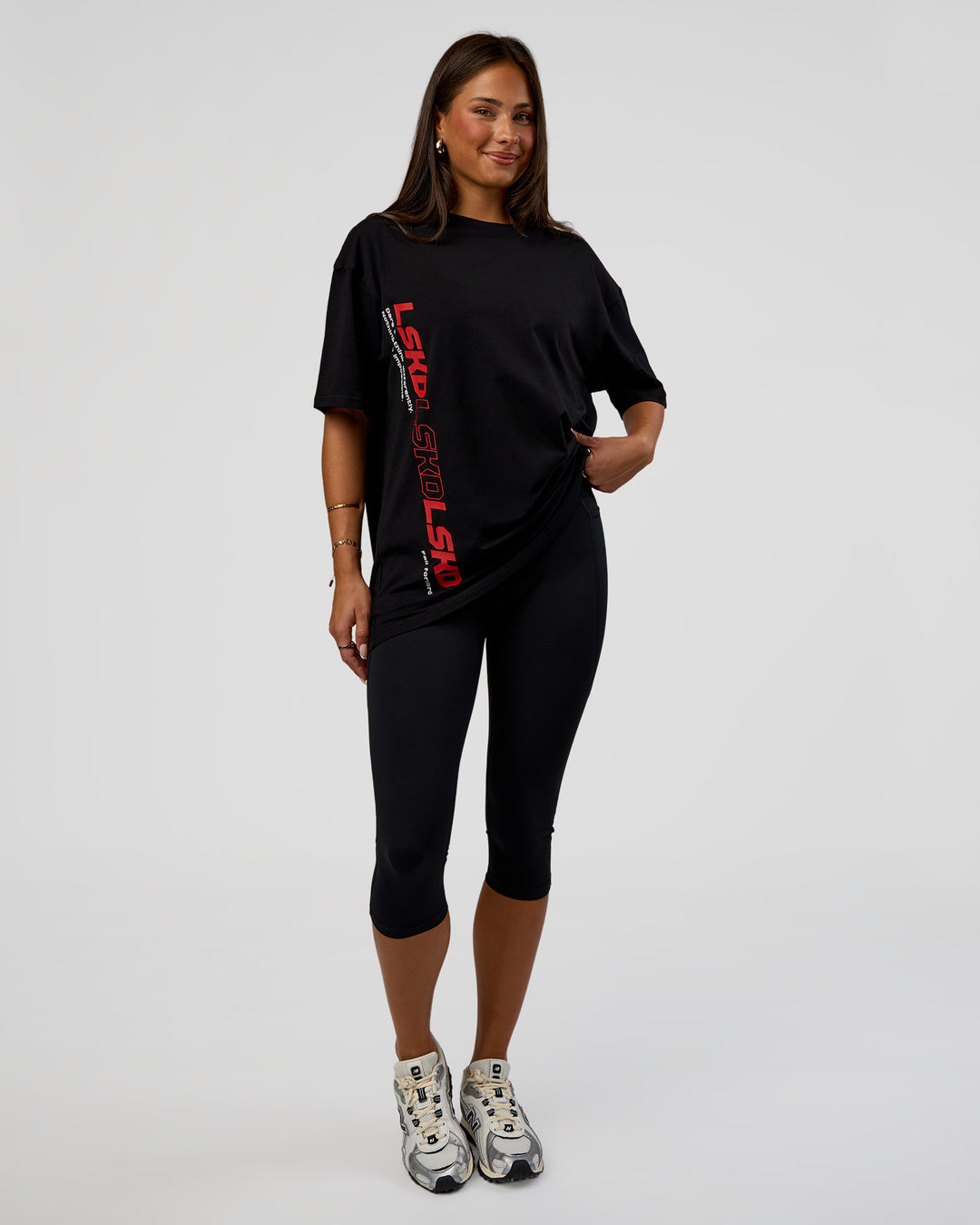 Woman wearing Nothing Is Impossible FLXCotton Oversized Tee - Black-Flame | Model:Bianca | Size:XS