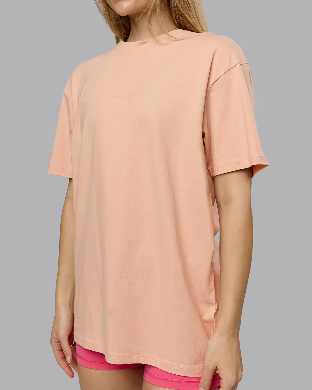 Woman wearing On Repeat FLXCotton Oversized Tee - Cameo Rose-Candy Pink | Model:Emilie | Size:XS