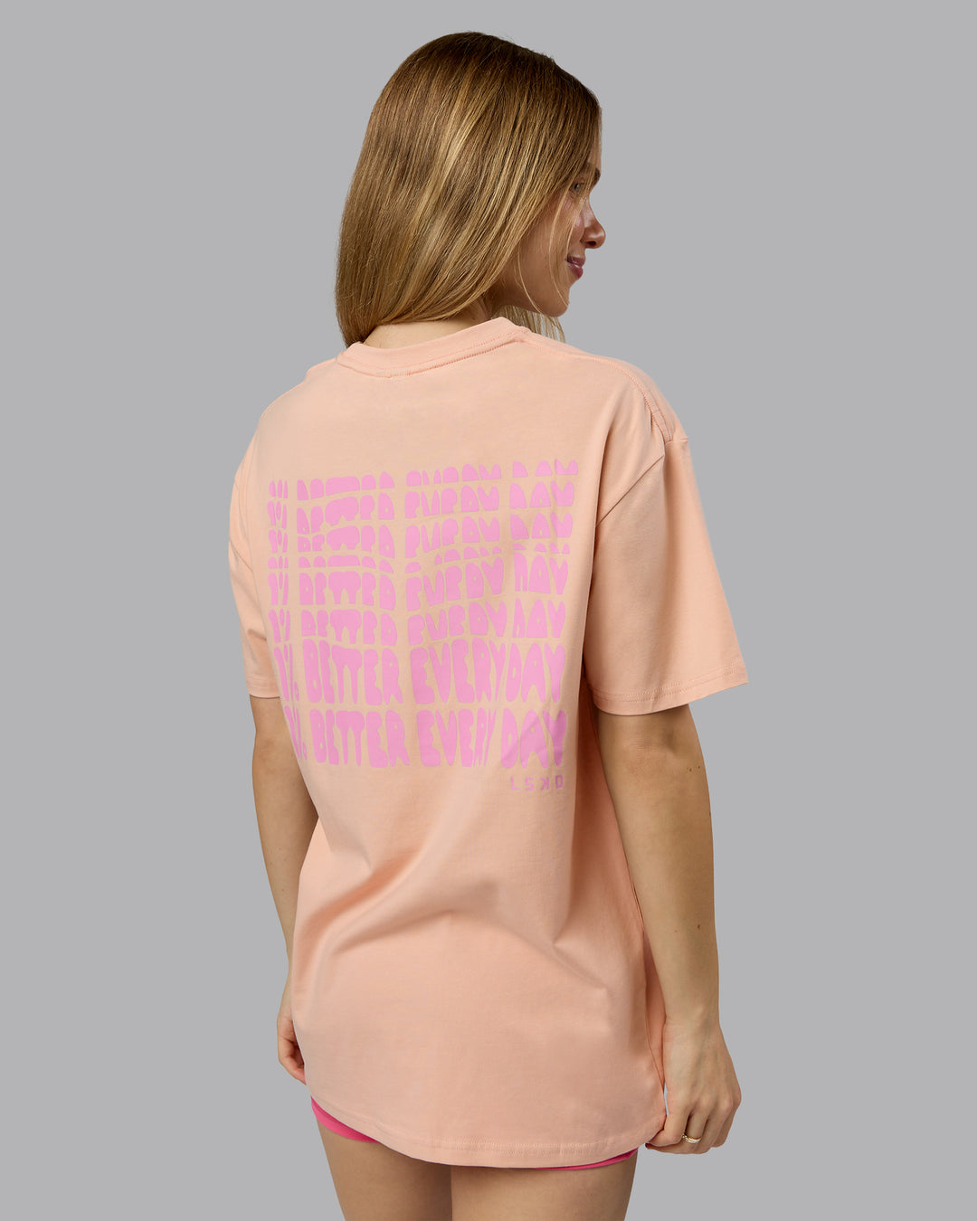 Woman wearing On Repeat FLXCotton Oversized Tee - Cameo Rose-Candy Pink | Model:Emilie | Size:XS