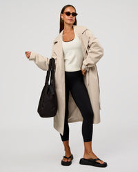 Woman wearing On the Move Trench Coat - Shale Beige | Model:Brylee | Size:XS