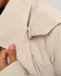 Woman wearing On the Move Trench Coat - Shale Beige | Model:Brylee | Size:XS