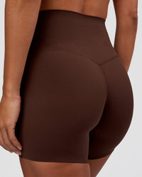 Woman wearing Peaches Elixir High-Rise 6” Short - Hot Chocolate | Model:Brylee | Size:XS