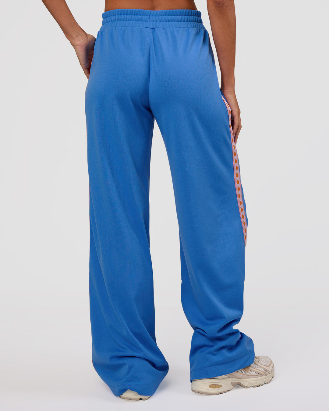 Woman wearing Peaches Track Pant - Palace Blue | Model:Brylee | Size:XS