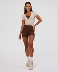 Woman wearing Peaches Wrap Cinch Top - Shale Beige | Model:Brylee | Size:XS