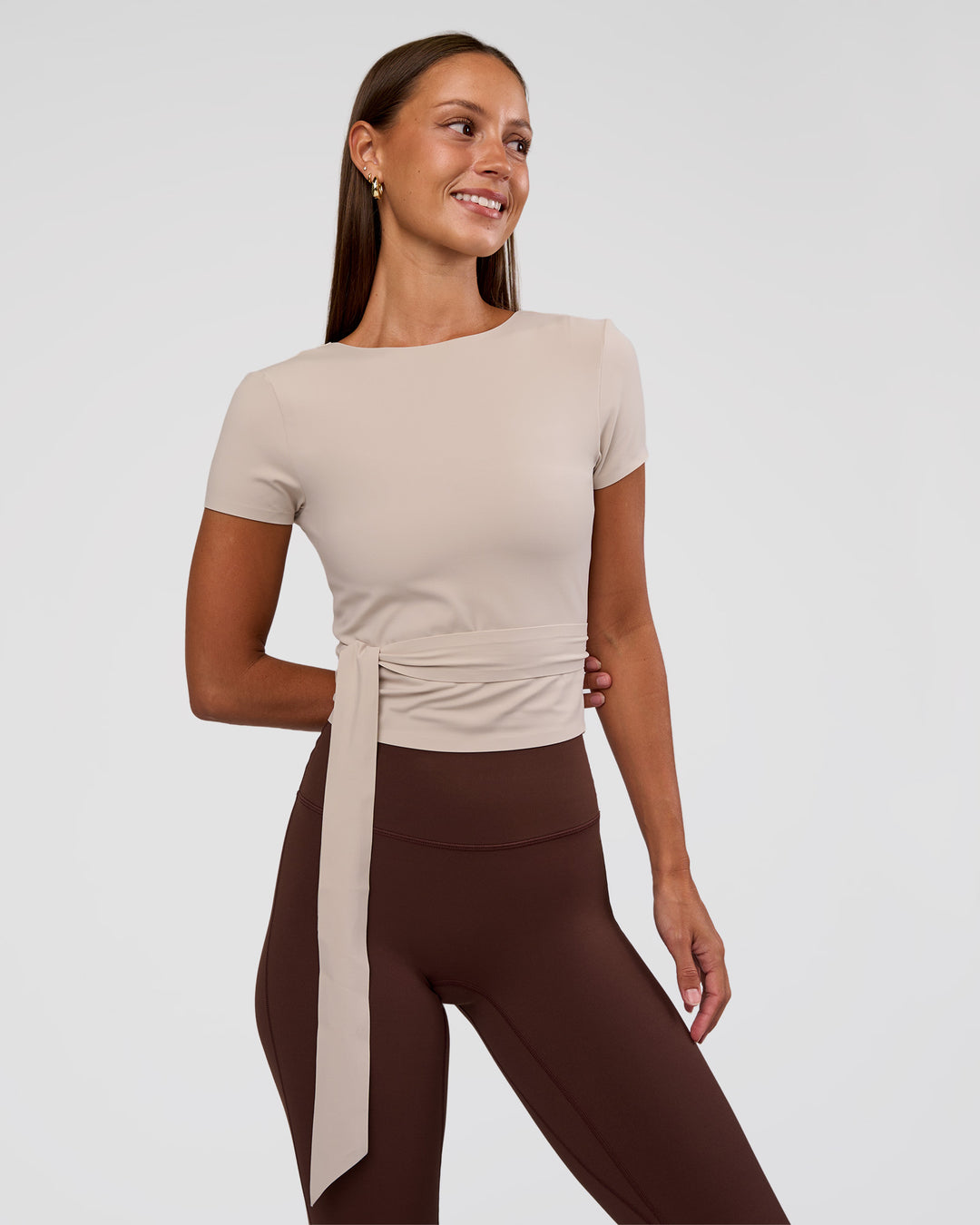 Woman wearing Peaches Wrap Cinch Top - Shale Beige | Model:Brylee | Size:XS