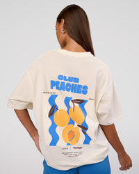 Woman wearing Peaches x LSKD Collection FLXCotton Oversize Tee - Off White | Model:Brylee | Size:XS