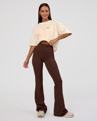 Woman wearing Peaches x LSKD Collection FLXCotton Oversize Tee - Off White | Model:Brylee | Size:XS