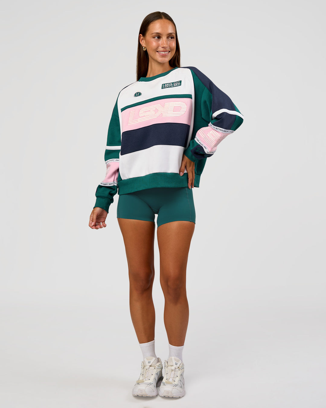 Woman wearing Power Sweater - Future Navy-Teal | Model:Brylee | Size:XS