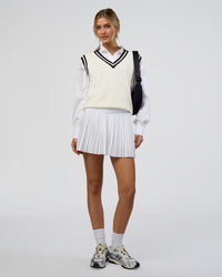 Woman wearing Precision Active Skirt - White | Model:Leilani | Size:XS