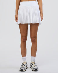 Woman wearing Precision Active Skirt - White | Model:Leilani | Size:XS