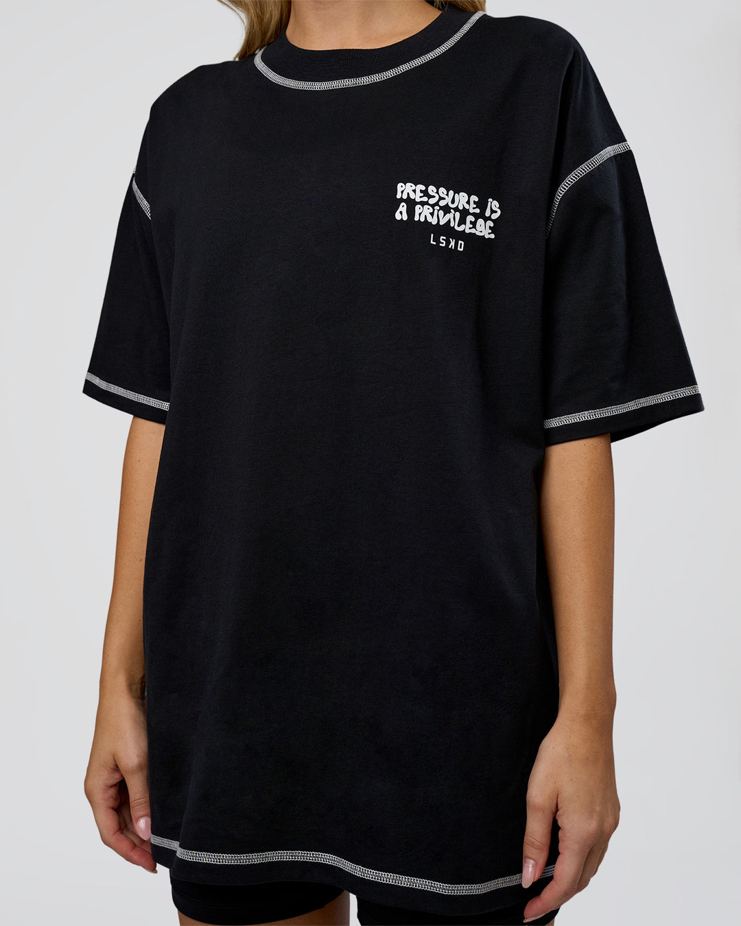 Woman wearing Pressure is Privilege Oversized Tee - Black-White | Model:Leilani | Size:XS