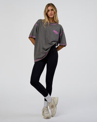 Woman wearing Pressure is Privilege Oversized Tee - Dark Storm Washed-Ultra Fuchsia | Model:Leilani | Size:XS