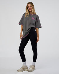 Woman wearing Pressure is Privilege Oversized Tee - Dark Storm Washed-Ultra Fuchsia | Model:Leilani | Size:XS