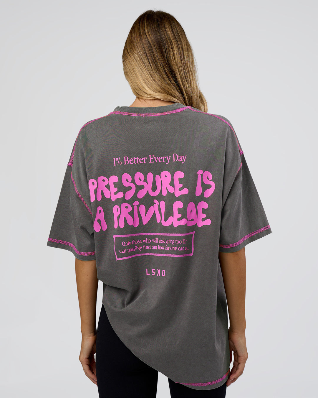 Woman wearing Pressure is Privilege Oversized Tee - Dark Storm Washed-Ultra Fuchsia | Model:Leilani | Size:XS