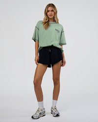 Woman wearing Pressure is Privilege Oversized Tee - Iceberg Green-Black | Model:Leilani | Size:XS