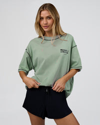 Woman wearing Pressure is Privilege Oversized Tee - Iceberg Green-Black | Model:Leilani | Size:XS