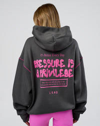 Woman wearing Pressure is Privilege Oversized Hoodie - Dark Storm-Ultra Fuchsia | Model:Leilani | Size:XS