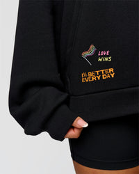 Woman wearing Pride Sticker Boxy Hoodie - Black | Model:Bianca | Size:XS