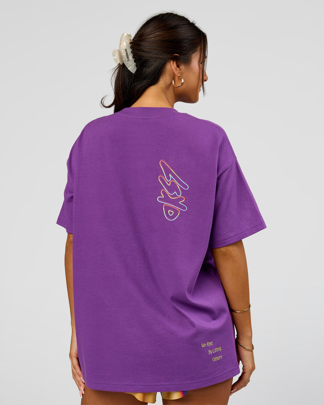 Woman wearing Pride Sticker Boxy Tee - Fresh Purple | Model:Bianca | Size:XS