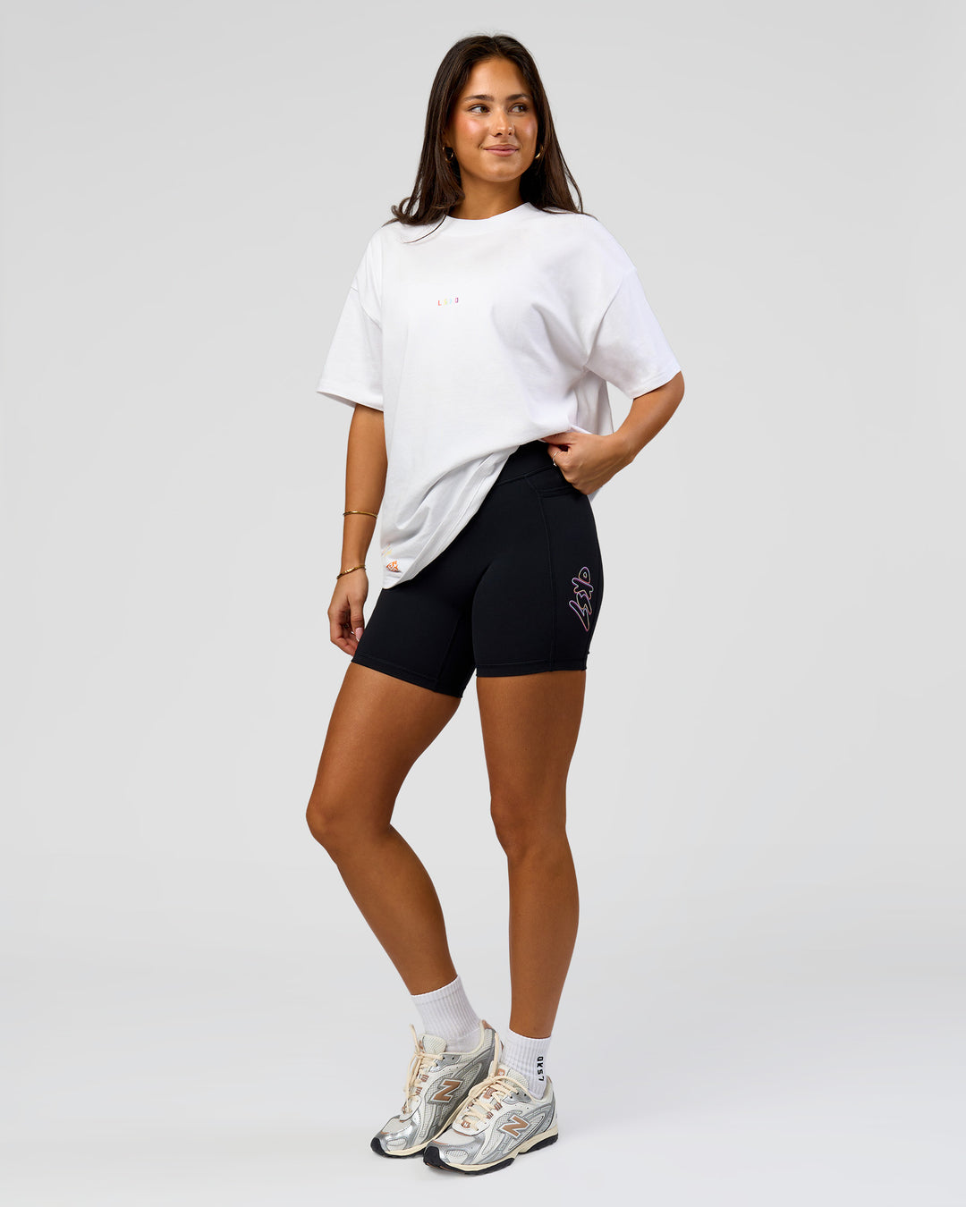 Woman wearing Pride Sticker Boxy Tee - White | Model:Bianca | Size:XS