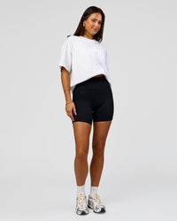Woman wearing Pride Sticker Boxy Tee - White | Model:Bianca | Size:XS