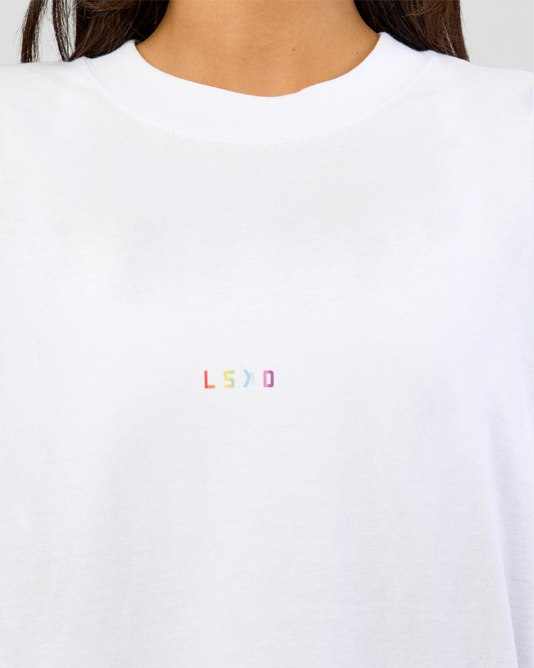 Woman wearing Pride Sticker Boxy Tee - White | Model:Bianca | Size:XS